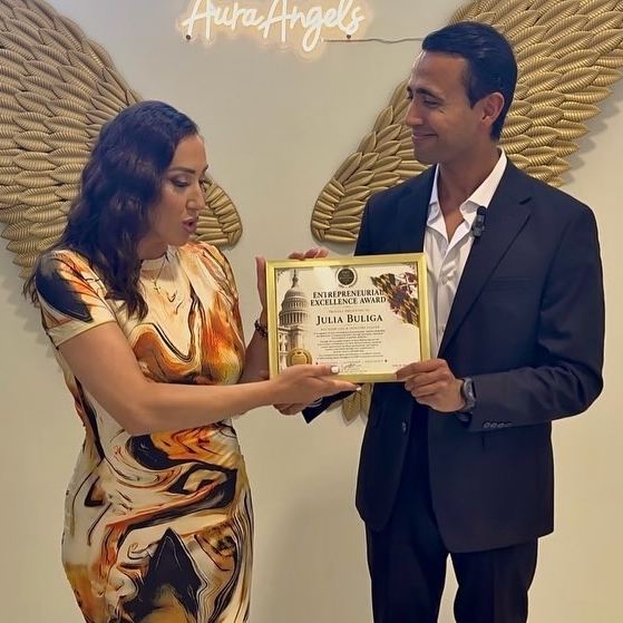 Honoree receiving a recognition certificate at a DMV Cigar Club experience